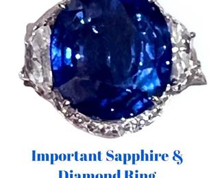 10.35 Carat natural blue sapphire ring mounted in 18k white gold surrounded by (2) half moon brilliant cut natural diamonds.  This ring comes with a November 2023 appraisal