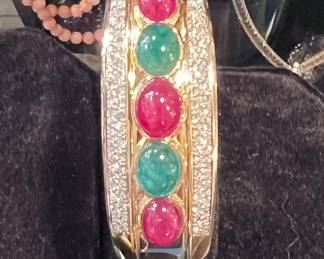 18k Diamond, emerald and ruby cuff bracelet.  This is stunning!