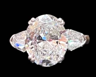 5.01 Carat center stone - This ring is stunning!  Color: F; SI1.  This ring comes with a new appraisal.