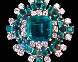 Large emerald and diamond pendant/brooch.  The center stone would be stunning in a ring!