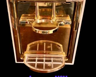 Mid-Century Modern gold plated rotating toothbrush holder in mint condition