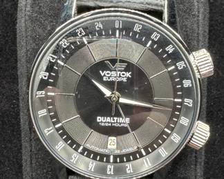 13	$320 	
Vostok Europe dual time GMT date 