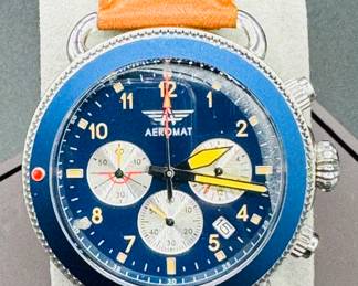 9	$36 	
"Aeromat Vol de Nuit with leather band 9 1/2"" box"	