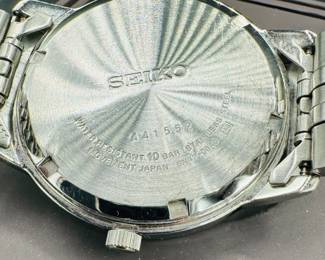 29	$50 	
Seiko silver face round, stainless steel "