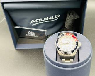 55	$280			
Aquinus in original box - Swiss Made. 