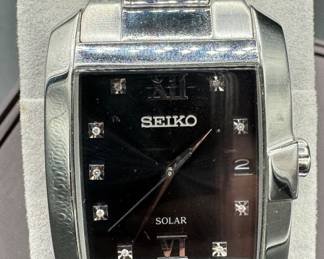 28	$70 	
Seiko tank watch solar SZ 6"" inside seam stainless"	