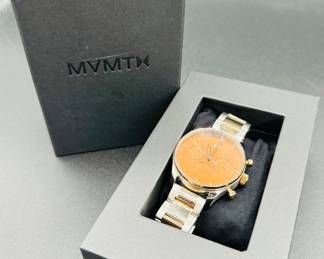 22	$25 	
MVMT Airshawk copper face two tone stainless steel 	"maple frost. Day, date, 24hour,running,extra links, box "	