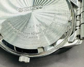 29	$50 	
Seiko silver face round, stainless steel "