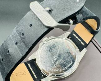 15	$60 	
J Brackett automatic black face / black leather band original band 