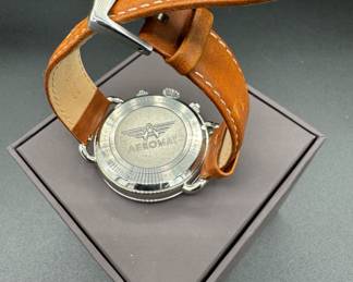 9	$36 	
"Aeromat Vol de Nuit with leather band 9 1/2"" box"	