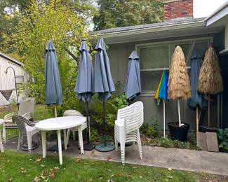 Patio umbrellas, table and chairs