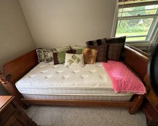 More throw pillows and second twin bed