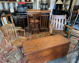 We have furniture in the garage at this sale!  Trunk, wood high desk, wood chairs, area rug