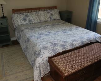 Full size bed, one of the comforters