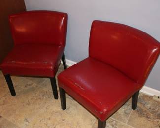 Two red side chairs, as is