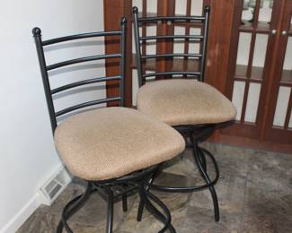 Two metal bar stools