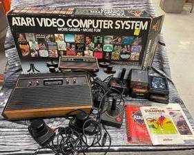 Vintage atari video computer system, works, with 9 games and controllers.