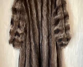 Back of full length raccoon coat