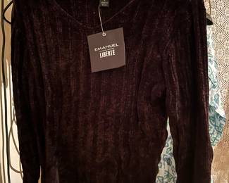 One of several Emanuel Ungaro sweaters new with tags as priced