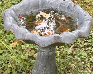 Two concrete birdbaths.