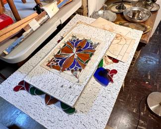 Unfinished stained glass projects.