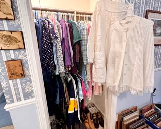 Closets full of clothing.