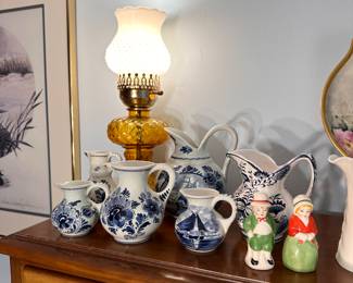 Collection of blue & white Delft pitchers.