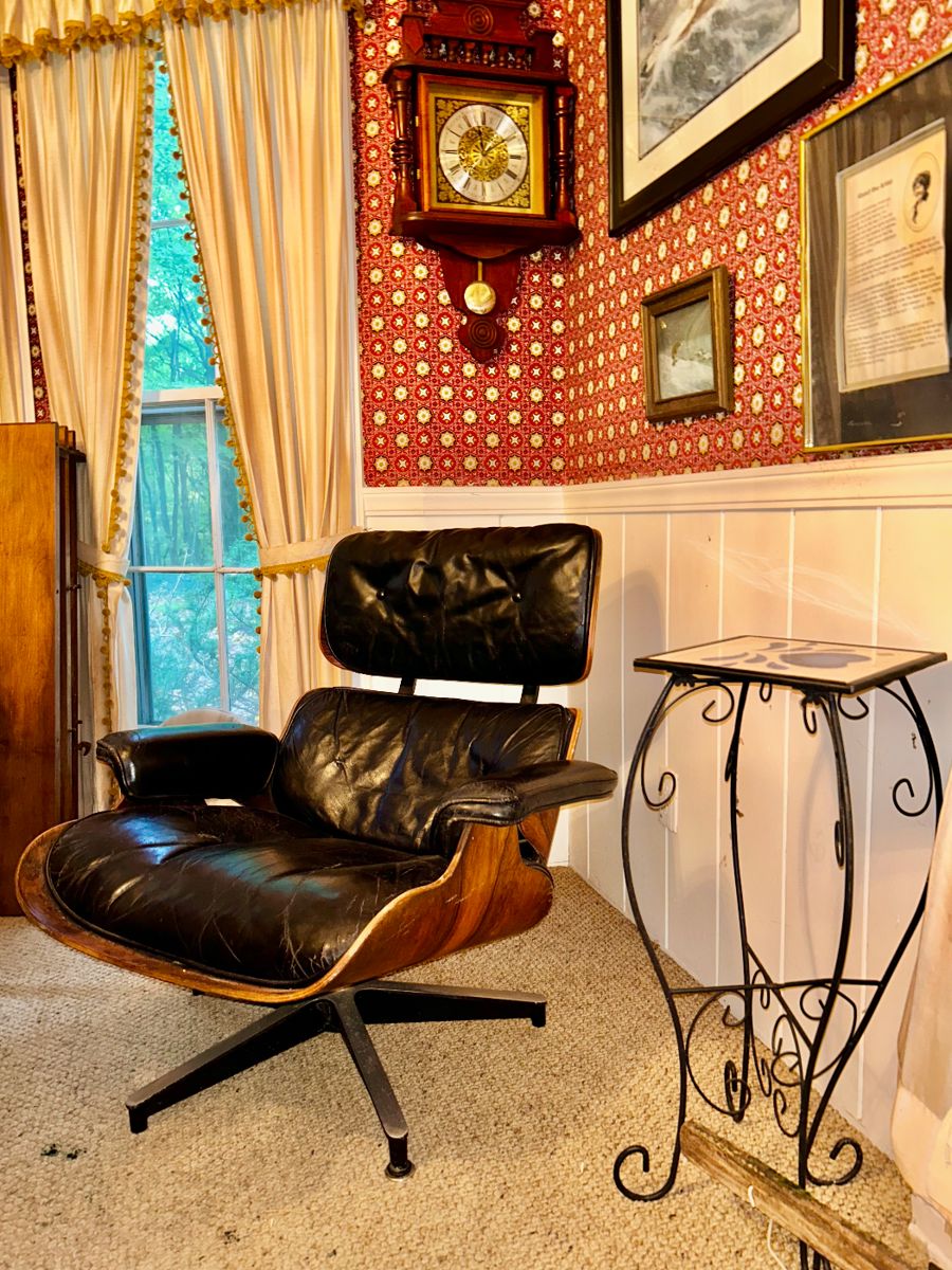 Authentic vintage Herman Miller Eames lounge chair.  It's a little worn, and needs a little attention...but it's real : )