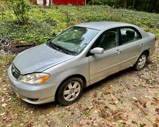 1999 Toyota Carola w/ new battery.  Has some rust and high mileage.  