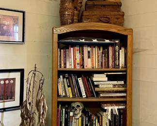 Oak bookcase full of great books! The poor plant has found a new home....