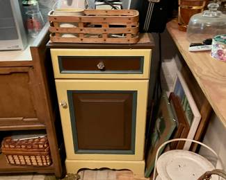 painted side table, blenders, Florida artwork in frames on floor... 