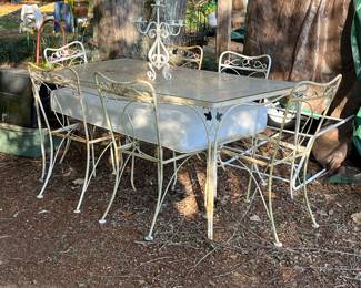 Vintage wrought iron glass top table and 6 chairs
