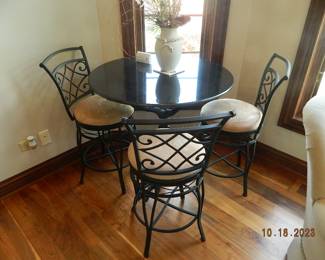 bronze based table with stools
