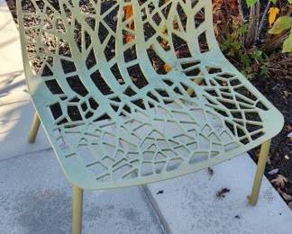 Chair is made of a light iron.