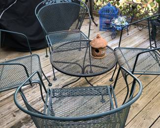 These 4 chairs have been removed from sale by family and will not be available for purchase. 
The table and everything else in this photo are still available. 