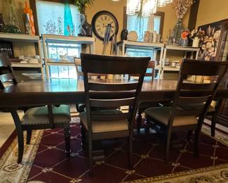 #2 -$450 
Mahogany stain dining table with double"pedestal table, 4 chairs, 2 arms 78Lx96 with leaf."