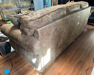 #19 - Tan faux leather sofa sleeper 88Lx37Dx36T Ashley brand - Good Condition	