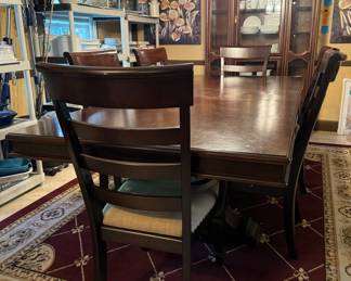 #2 -$450 
Mahogany stain dining table with double"pedestal table, 4 chairs, 2 arms 78Lx96 with leaf."