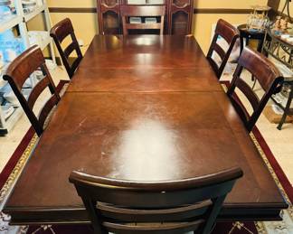 #2 -$450 
Mahogany stain dining table with double"pedestal table, 4 chairs, 2 arms 78Lx96 with leaf."