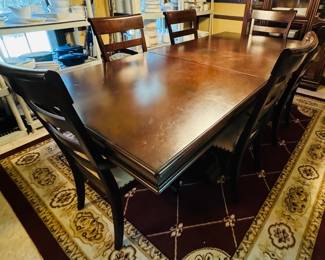 #2 -$450 
Mahogany stain dining table with double"pedestal table, 4 chairs, 2 arms 78Lx96 with leaf."