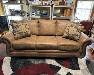 #19 - Tan faux leather sofa sleeper 88Lx37Dx36T Ashley brand - Good Condition	