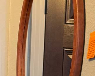 #37 - $60 brownleather style oval mirror 23x30	