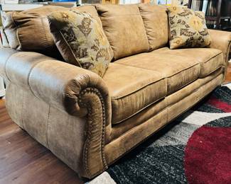 #19 - Tan faux leather sofa sleeper 88Lx37Dx36T Ashley brand - Good Condition	