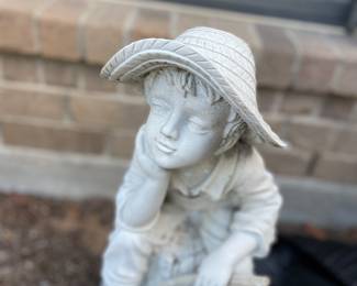 Outdoor statues both concrete and plastic