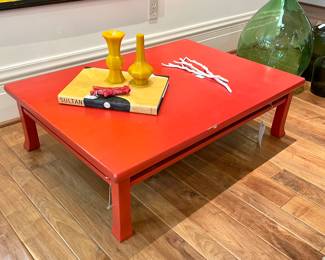  - reddish-orange Chabudai with flared feet and trestle on each side. 42 x 30 x 12; $70 -   “Donald Sultan The Theater of the Object” coffee table book by Carter Ratcliff; $52- 6 x 4; red coral fragment; $180 -13 long; set of 3 white, porcelain branches. 
