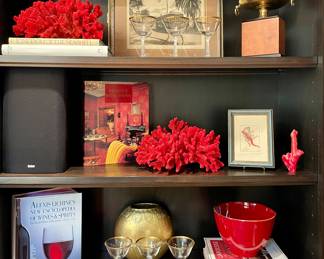 Visit this sale in person to see all the decor available at this sale.  $150 - brass trophy bowl on stand; $150 - Phillip Sage “Round the Bend” signed and numbered etching - 18.5 x 15.5; $38 - Ventri Red Bowl; $48 - Brass vase with embossing 