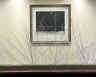 $350  White twigs with moss in brushed chrome vase designed by Twigs and Moss - 60 x 3 x3. Heavy! GREAT piece to make your own by adding ornaments, faux floral/greenery, etc. 