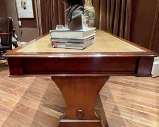 Side view of $4800 - Antique partners table with top inlay of beautiful leather, 2 drawers on each sid, brass claw feet - with minor leather damage - 71x35x30