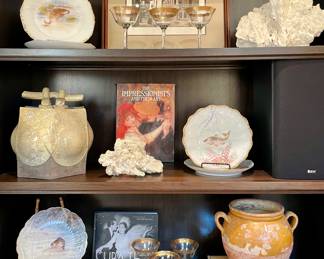 Lots of exquisite home decor at sale, including Italian pottery, original artwork, antique dishes and glassware, and books. $100 (each) - Vintage Limoges Fish plates - (5 available); $150 - Philip Sage “Royal Street” signed and numbered etching  -18.5 x 15; $250 - antique French confit pot ; $250 - hand crafted craquelure pottery apothecary by Lucia