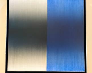 Close up of “Shift (Blue)” by Eric Freeman; circa 2017; 20” x 20” unframed; 21” x 21” framed; sold as a suite of 3; original paintings on canvas with artist signature and date on back; framed in brushed chrome metal with black interior space between frame and canvas ($9000 set of 3)